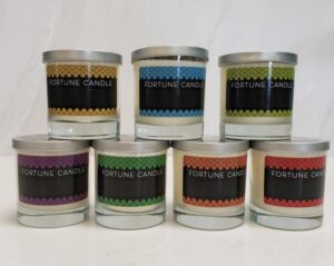 A variety of giftable fortune revealing 9oz candles.