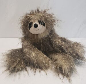 Jellycat's fluffy 16" Cyril sloth in browns, creams, and black