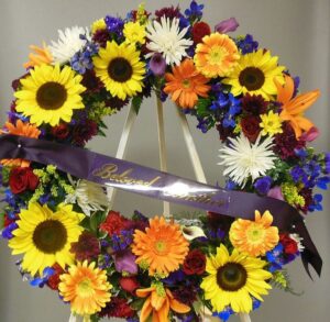 Brightly colored flowers adorning a wreath