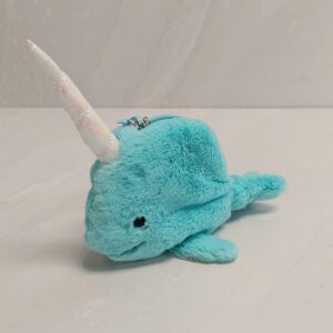 Jellycat's narwhal pouch in bright blue