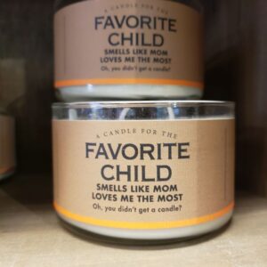 A 10 oz giftable candle from Whiskey River Soap Co. called favorite child